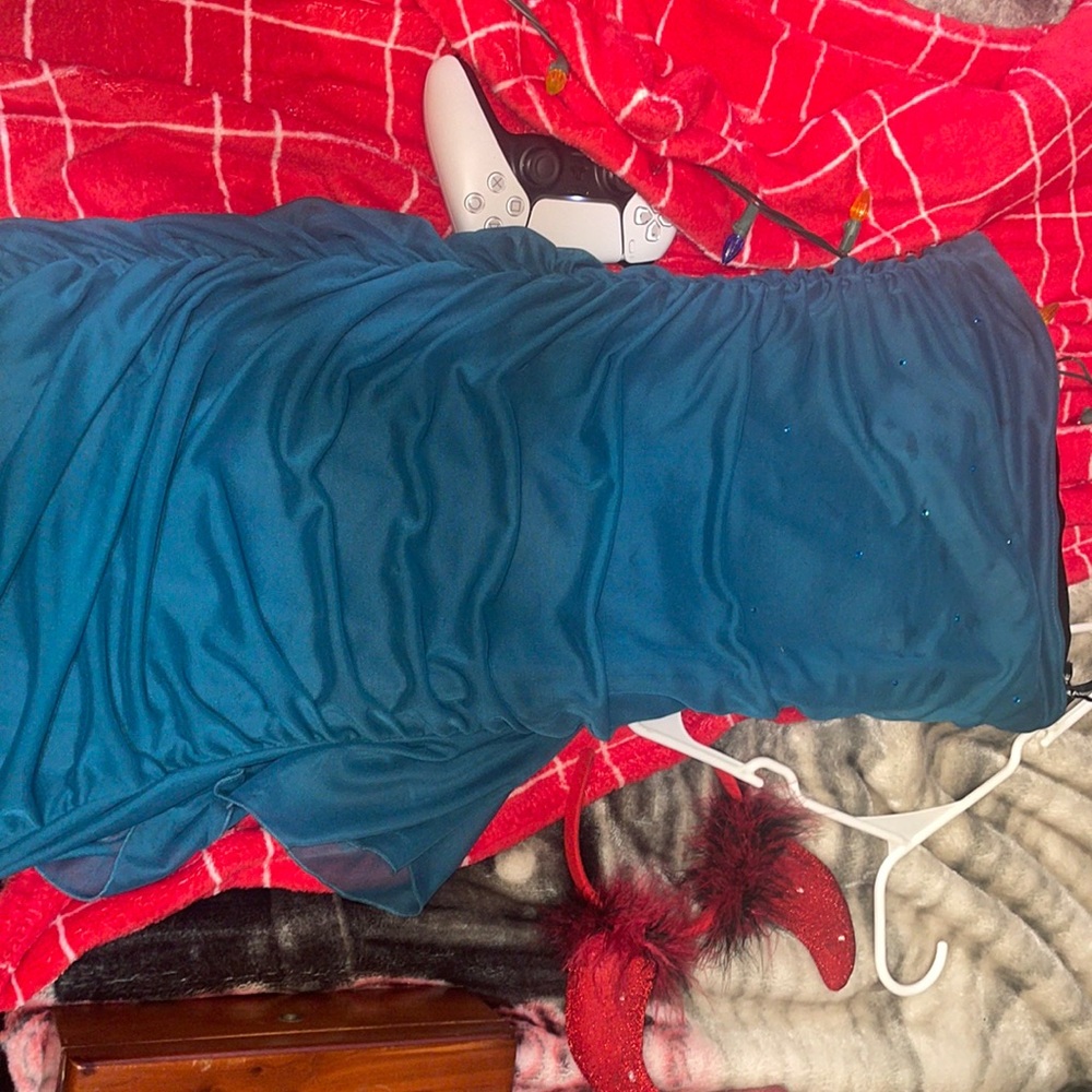 blue strapless dress with ruffles at the bottom